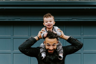 Father and son together smiling