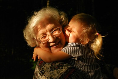 Granddaughter hugging Great Grandma